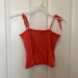 Pink crop top with tied straps